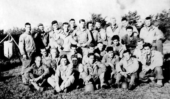 Picture illustrating a group of Noncoms of the 107th Evacuation Hospital. Taken during fall of 1944, in the European Theater, either in Luxembourg or in Belgium.
