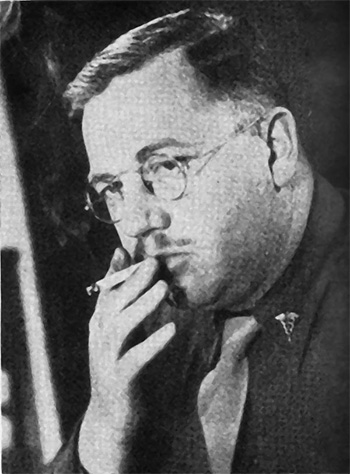 Portrait photograph of Major Charles E. Tegtmeyer, Regimental Surgeon, smoking a cigarette. 