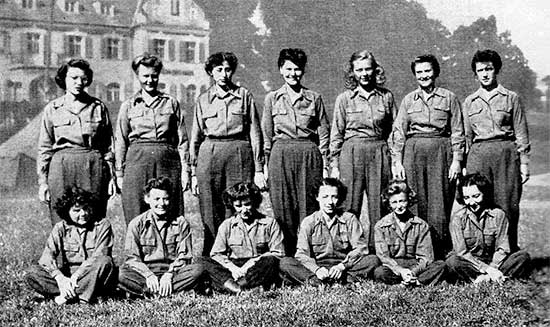 Photograph illustrating some ANC Officers of the 34th Evacuation Hospital Surgical Section. Back Row, from L to R: Lieutenants Harriet G. Markle; Harriet J. Ives; Rose E. Grinberg; Pauline E. Kruzik; Delphine J. Pasinski; Ethel M. Peters, Esther R. McCarthy. Front Row, from L to R: Iris J. Ezzell; Sally T. Watson; Nedra E. Schwartz; Helen A. Surface,Marjorie Chalkley; Laird Sullivan.