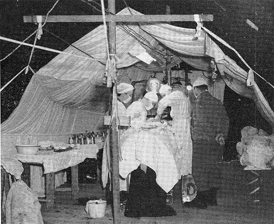 Illustration demonstrating standard operating procedure in the field. Photograph taken at the 11th Field Hospital. 