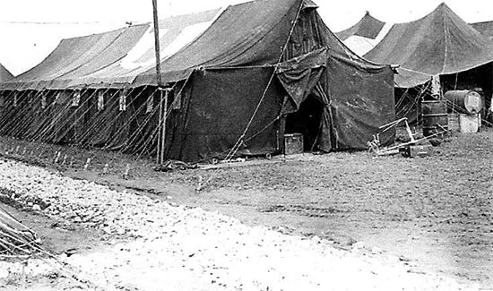 Vintage photo illustrating a typical Sectional Hospital Tent. The tent’s dimensions were 54 feet in length, 18 feet in width, and 12 feet in height, and the canvas was made of fire and mildew-resistant material.