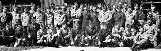 Group picture illustrating 58th General Hospital Officers in front of the Headquarters building at Stowell Park, Gloucestershire, England, some time following the unit’s arrival and where they would remain until May 12, 1944.