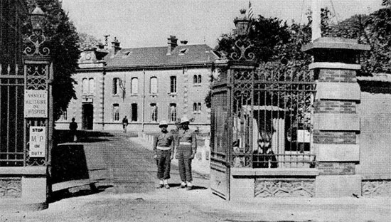 Picture showing the main entrance to the 58th General Hospital, at Châlons-sur-Marne, in Northern France. This would be the Hospital’s last operational setup in France. The organization occupied the former French Military Hospital buildings from July 12, 1945 until September 15, 1945.  
