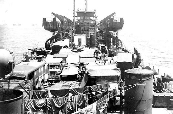 Picture taken aboard LST # 504 enroute to France. The vessel carried the vehicles and drivers of the 58th General Hospital to Utah Beach, Normandy, where debarkation took place July 30, 1944.