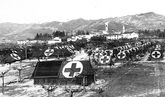 Partial view of the 56th Evacuation Hospital located in a grape orchard, a little south of Scarperia, Italy, where the organization would celebrate Thanksgiving and spend the coming winter. The Hospital’s Commanding Officer, Colonel Henry S. Blessé, was to leave the unit during its stay at Scarperia, after receiving orders to return to the Zone of interior on March 4, 1945.