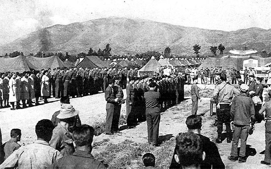 May 15, 1944. Formal review and formation of the 56th Evacuation Hospital attended by Lieutenant General Mark W. Clark who presented 18 Bronze Star Medals to staff and personnel for heroic achievements at Anzio, Italy. 